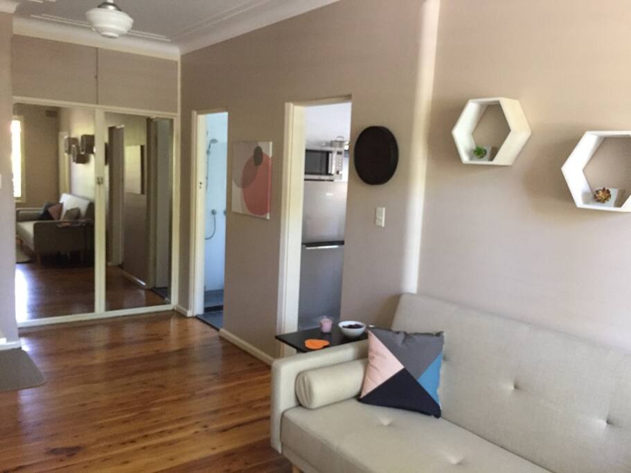 Full refurbished unit with polished wooden floors.