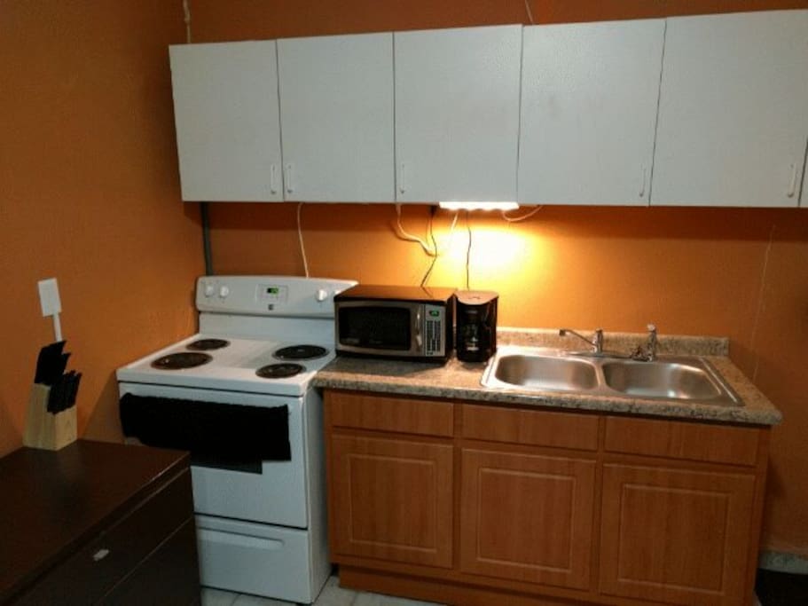 Stove, oven, microwave and a coffee maker included.