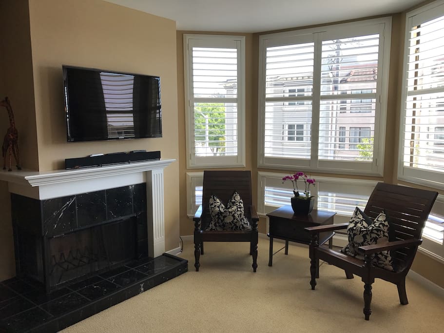 Enjoy a quiet sitting are by the fire or a movie on the swivel flatscreen