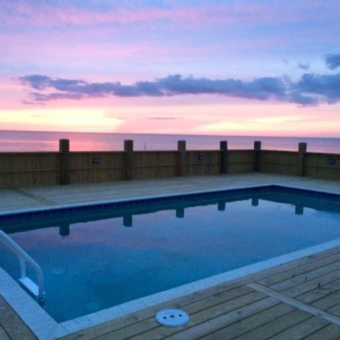 A unique spot in OBX - serene, private, spacious, with heated pool, hot tub, ping pong and access to tennis club nearby.
Kick back and relax on the deck with your family and friends and enjoy million dollar views of the water as far as the eye can see!
View to the West.