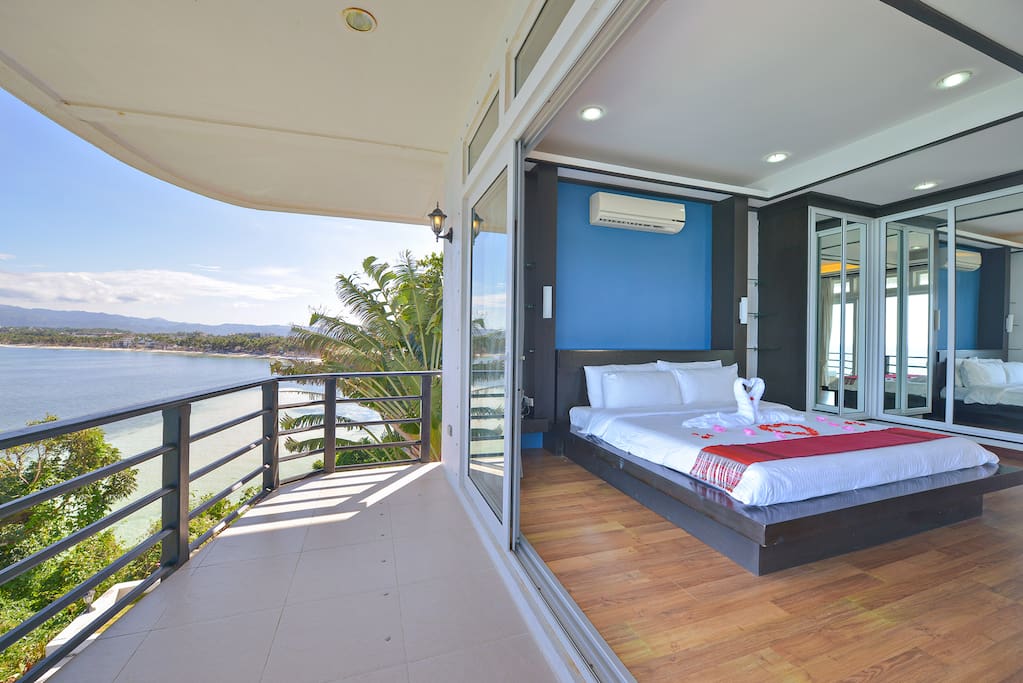 Oceanview master bedroom with terrace patio
