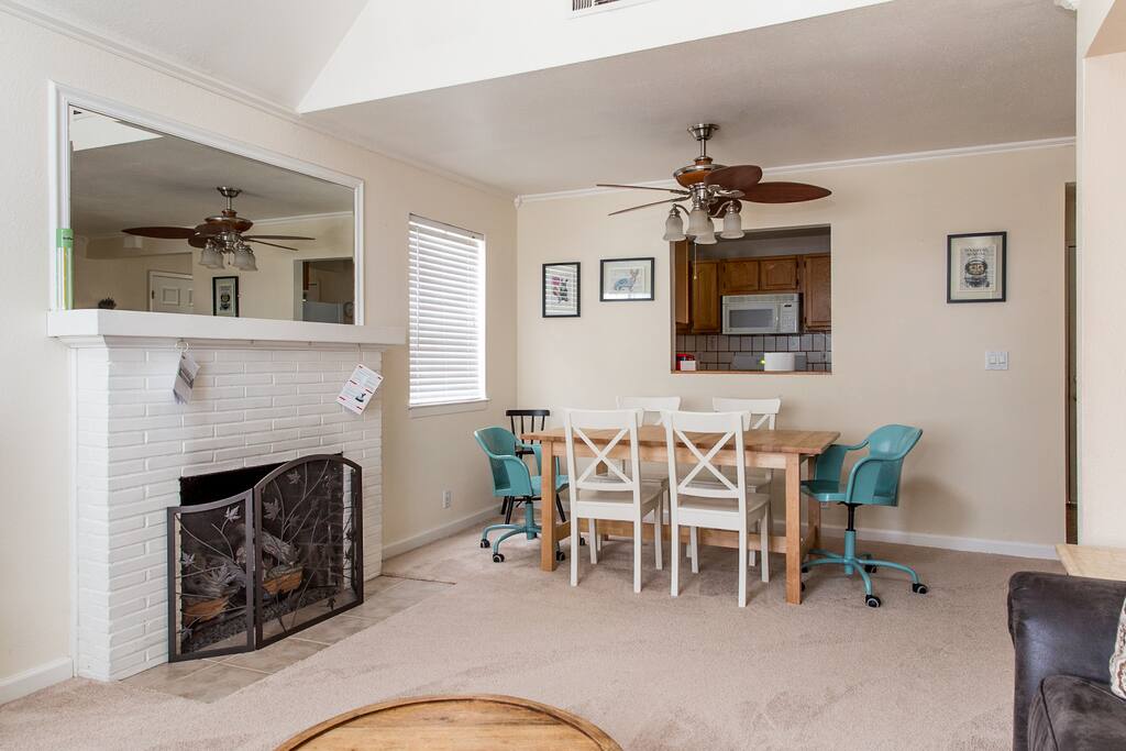 Gas fireplace & dining table.