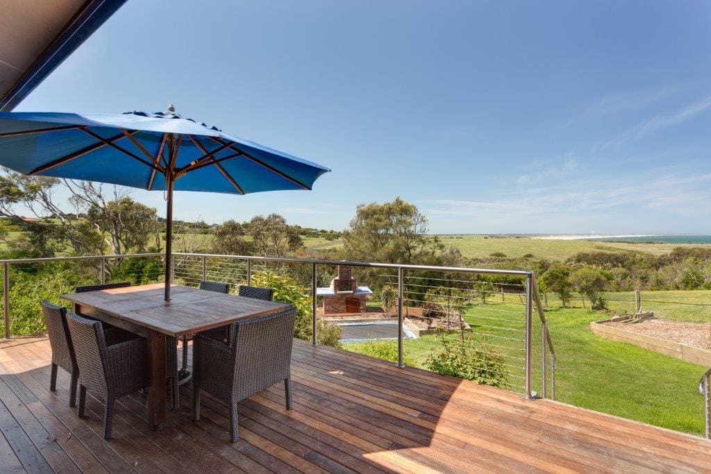A Patio, Wood Pizza Oven, An InGround Trampoline to Make it A Unique Australia Coast Experience