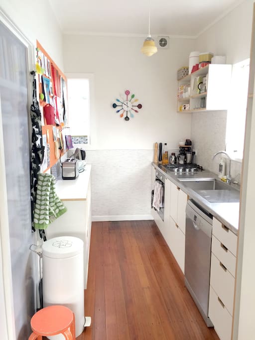 New kitchen with gas hob, electric oven, dishwasher, and fridge (please note: no microwave).