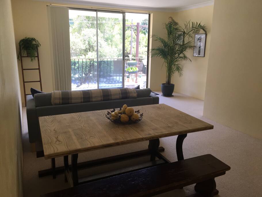 Open plan living/dining room also with private balcony.