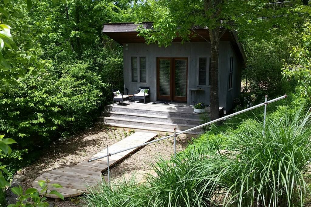View of studio showing staircase and boardwalk.