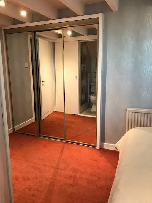 En suite shown in mirror. Need to take a better photo