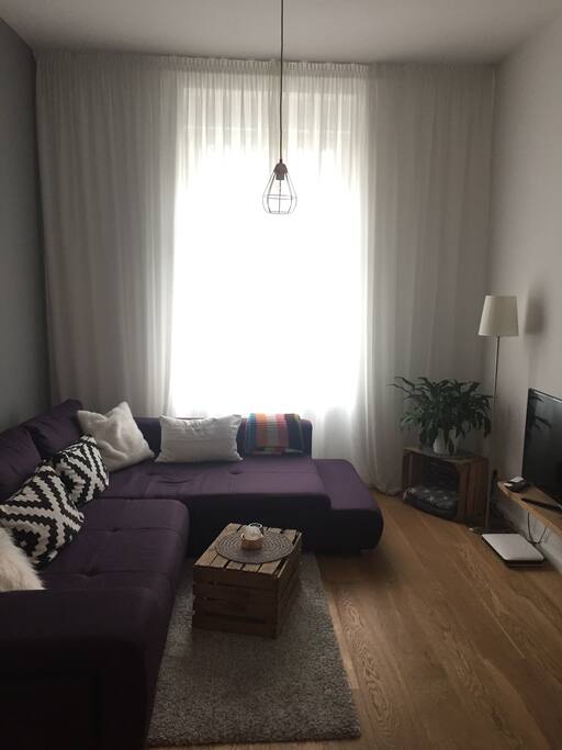 Wohnzimmer mit Schlafsofa