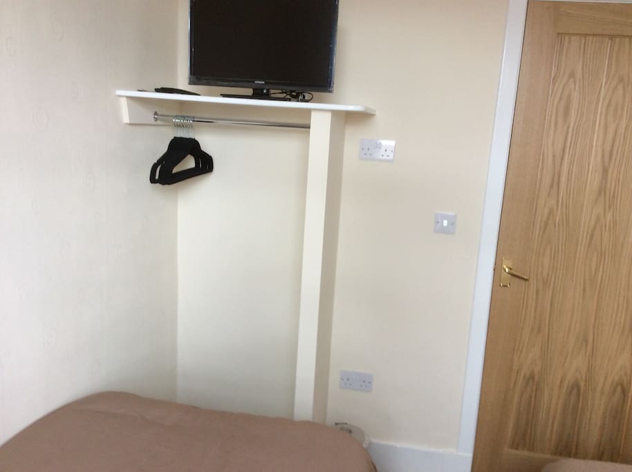 Tv and closet twin room