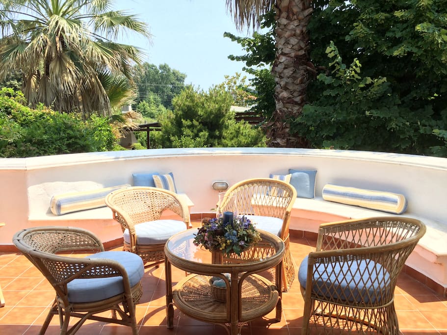 Circular veranda with view of luscious garden