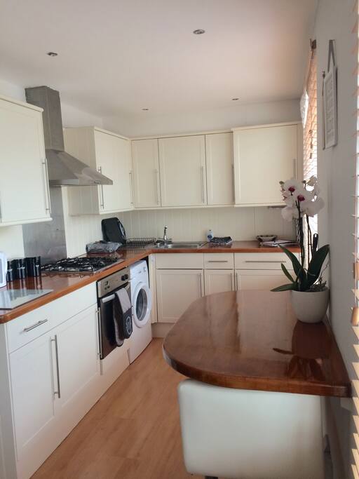 Sunny kitchen overlooking street below