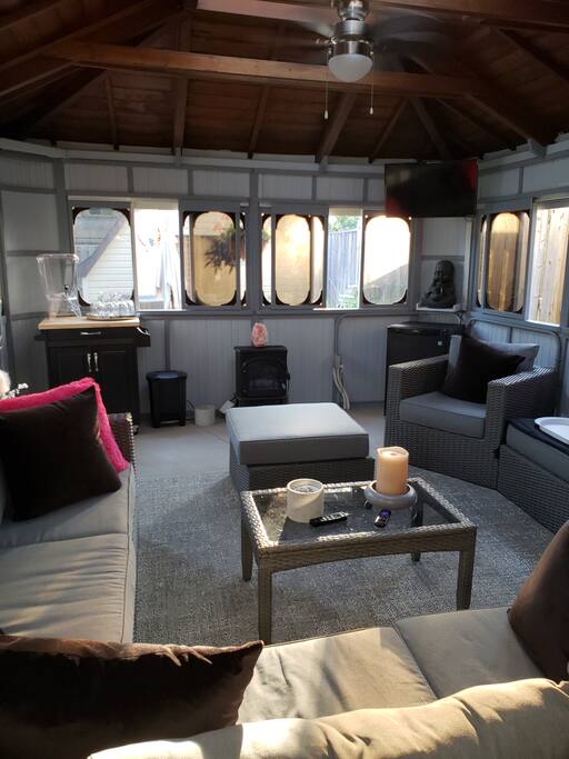 Serving cart, fireplace, bar frig, TV
(Netflix, CBS All Access) air conditioning, charcoal air filtration system