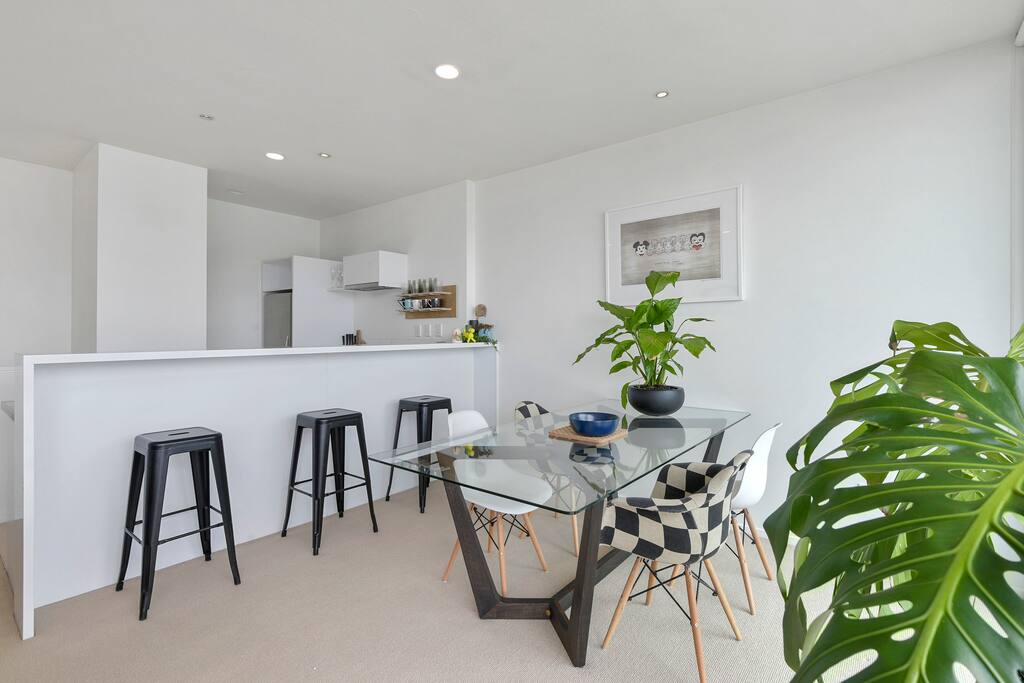 Sit at the bar stools and have a chat to someone in the kitchen.