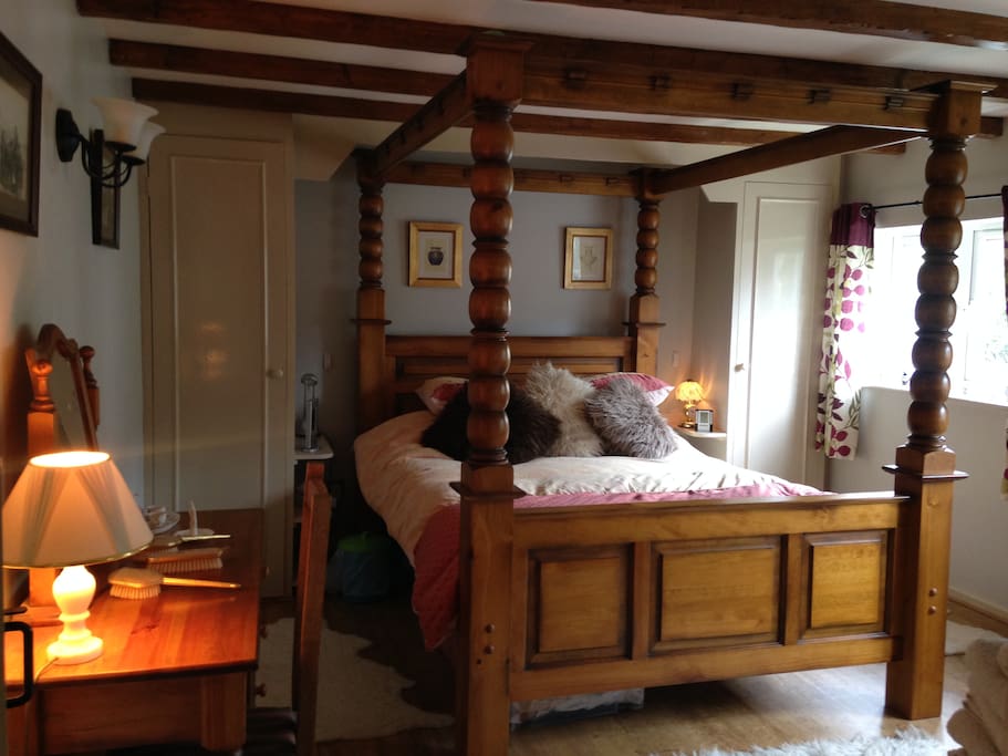 main bed room 4 poster bed with down stair bathroom all on one floor