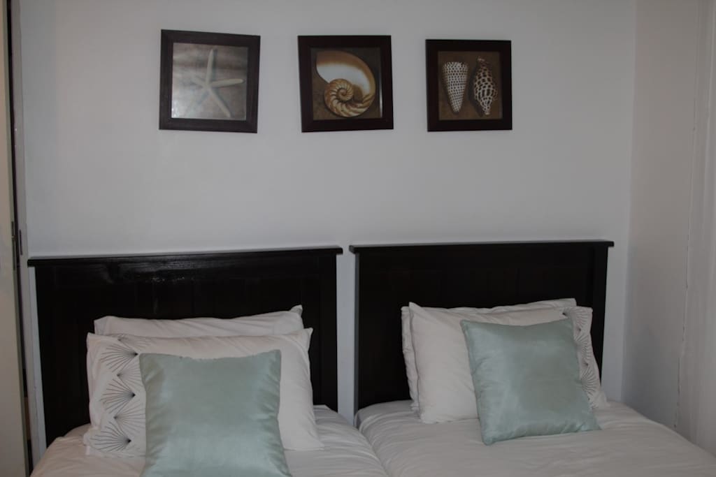 One of our rooms has two single beds and a ensuite for guests who would require such an arrangement or for families with children.