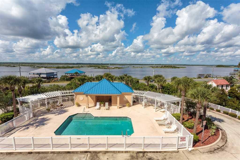 Options galore at Bella Mar 202 - The dunes are just below our balcony on one side, while the condo swimming pool and the placid