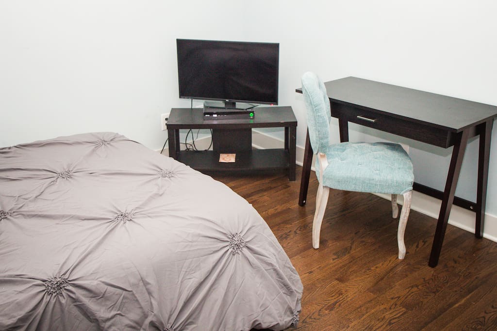 Bedroom 1 - Queen Bed with Television and Desk
