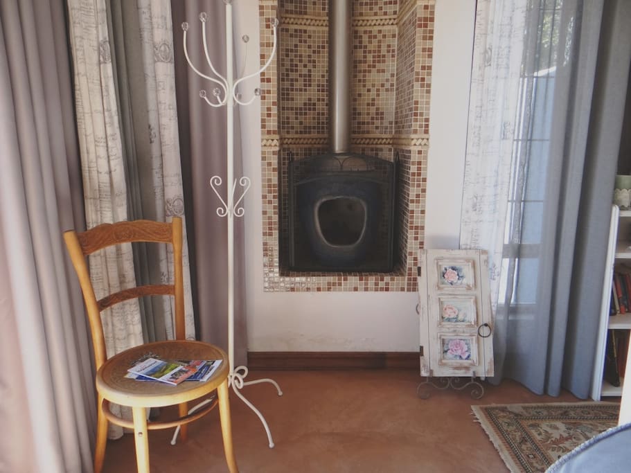 The fireplace with safety firescreen.