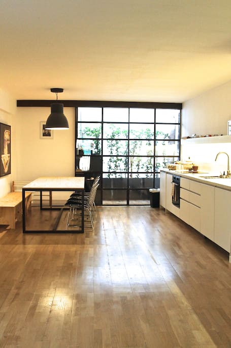 Bespoke furniture gives this space a 'Manhattan' loft feel.
