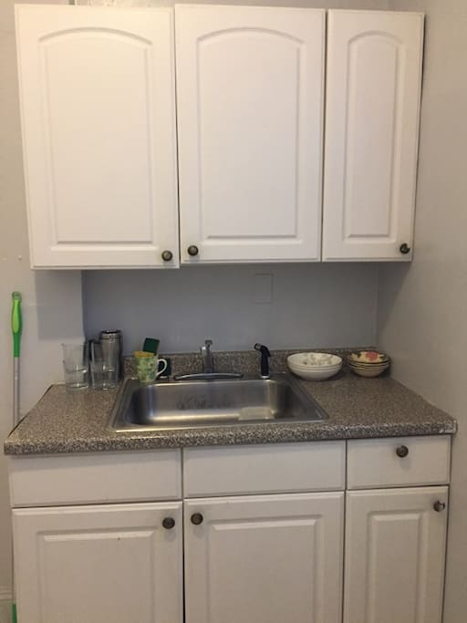 Spray hose in kitchen sink.