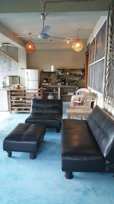 The guesthouse has an outdoor kitchen, dining and sitting area on the terrace.