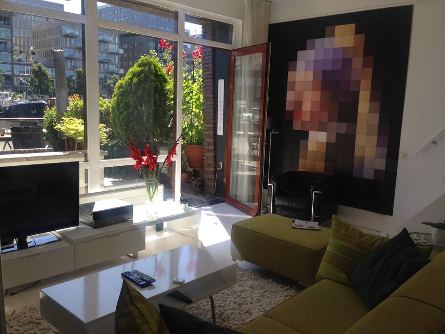 Quiet livingroom with view on the canal