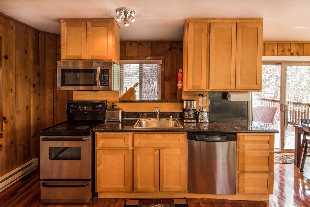 Stainless, granite and maple kitchen. Dishwasher, fridge/freezer with water and ice maker, microwave, oven stove and fully stocked cooking utensils