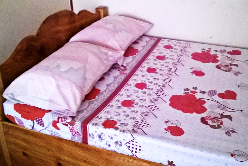 Bed by the doorway