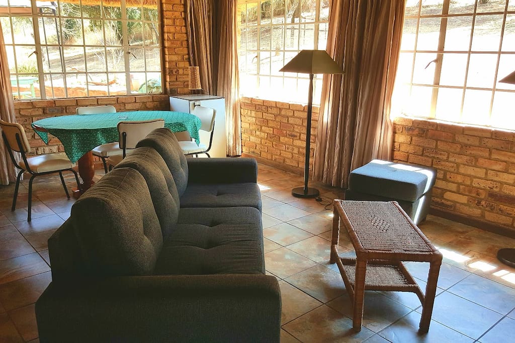 Two units rented out together - living area with DSTV
