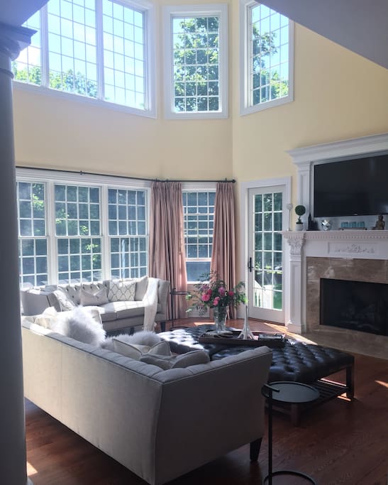 Huge 2 story Family room with brilliant morning sunlight, perfect place for coffee