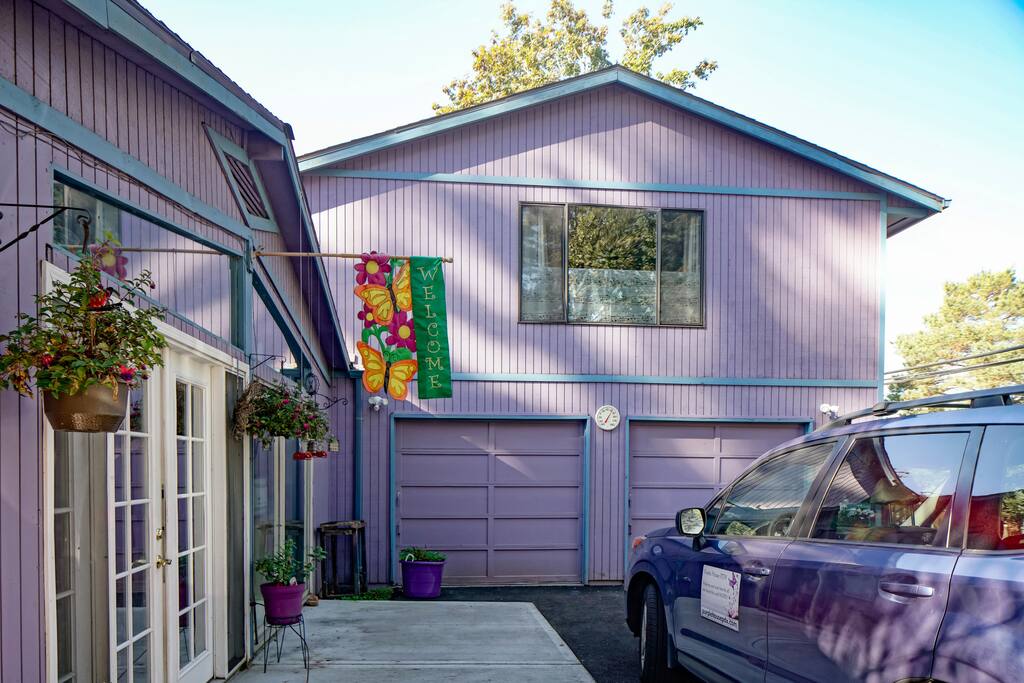 Attached but separate, your upstairs studio apartment with your own off street parking space right by the stairs.