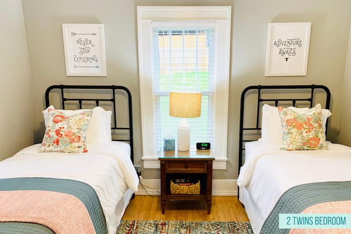 The twin bedroom offers two extra-long twin beds, luxurious sheets, a comforter with duvet and/or coverlet. The room also has a ceiling fan, desk fan, plenty of electrical outlets, a bedside USB charging station, desk, and mirrors. 