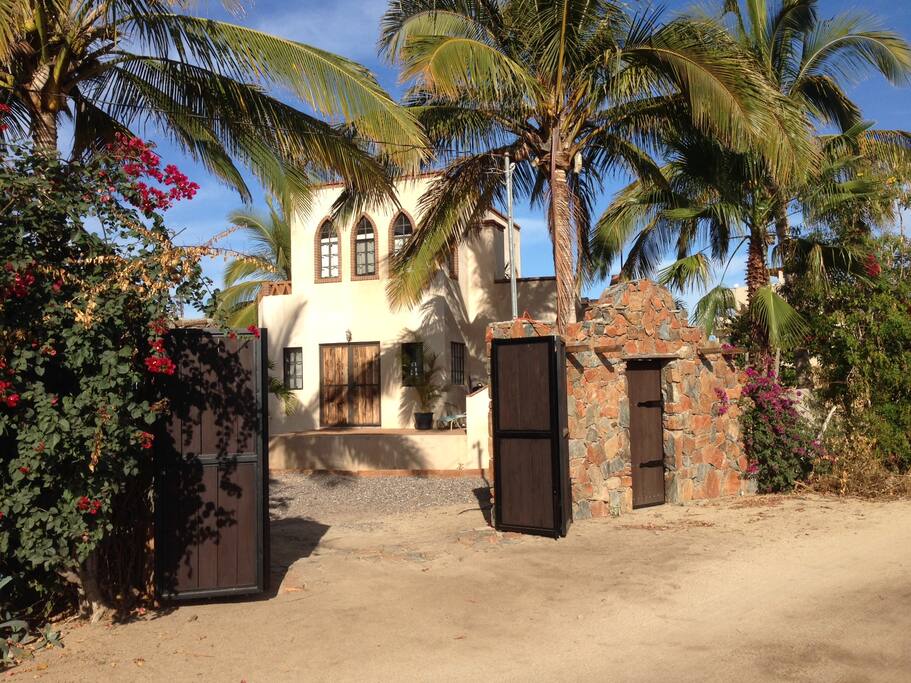 Enclosed large yard with vehicle and pedestrian entry gates