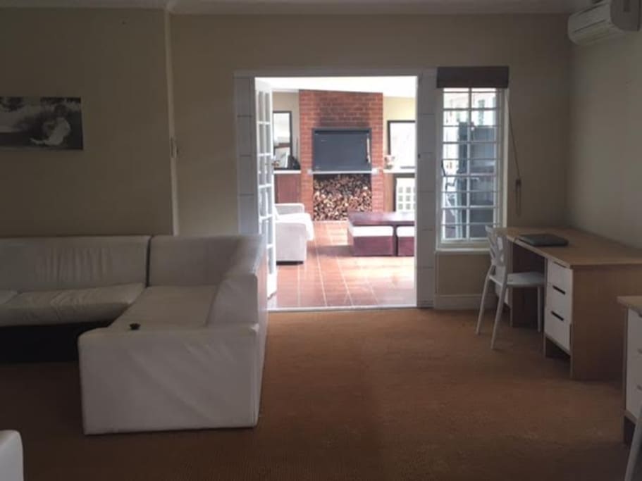 Lounge, study leading to outside patio