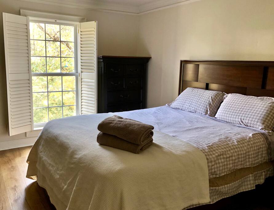 Private bedroom with a forest view