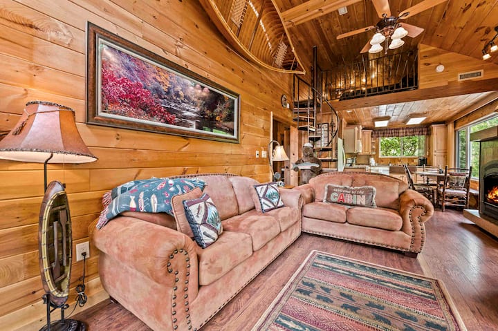 Upscale decor throughout cabin. Living room features a unique canoe to accent our Riverside Retreat. 