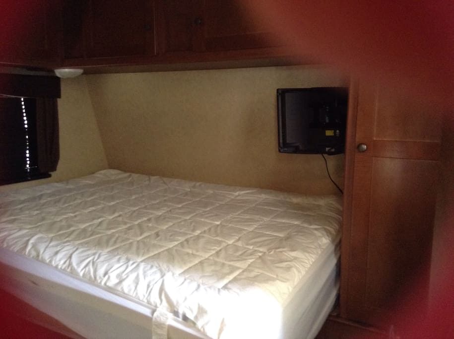 Private bedroom with TV. And plenty of storage