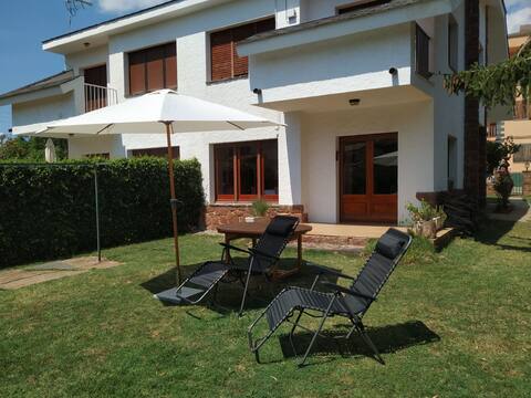 House with garden and fireplace