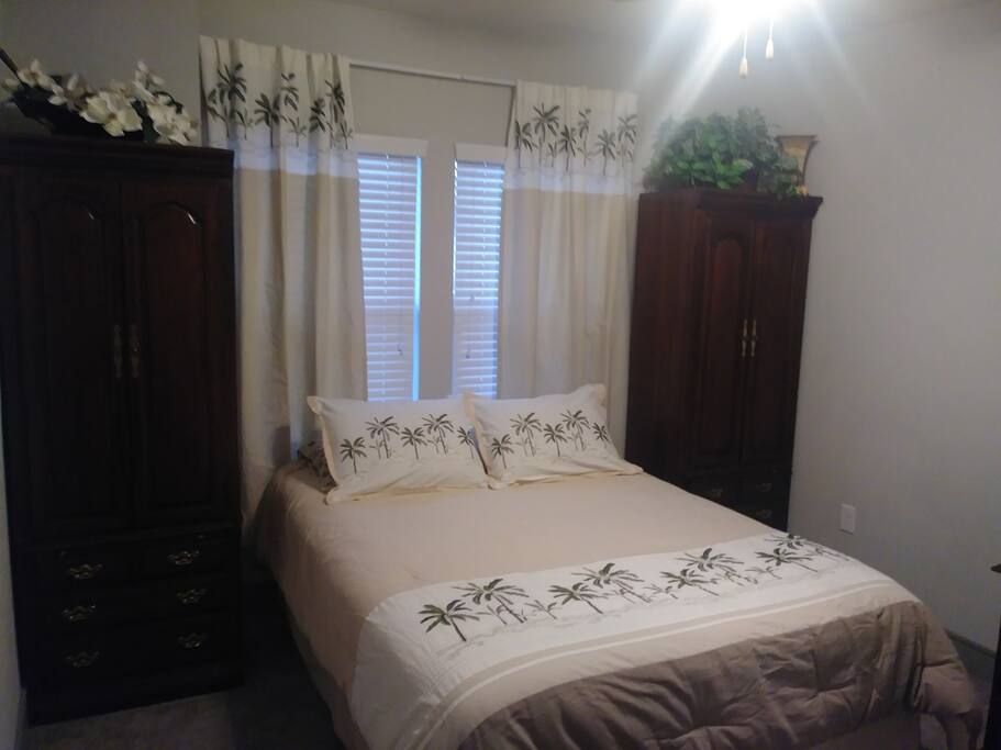 Queen sized bed, large drawer space with pull out trays, black-out drapes, desk, chair, large walk in closet