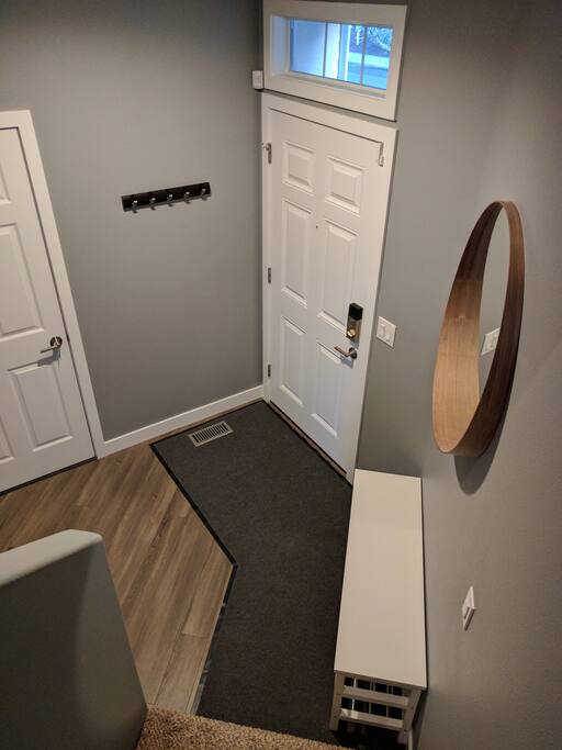 Entryway with ample shoe storage under the bench