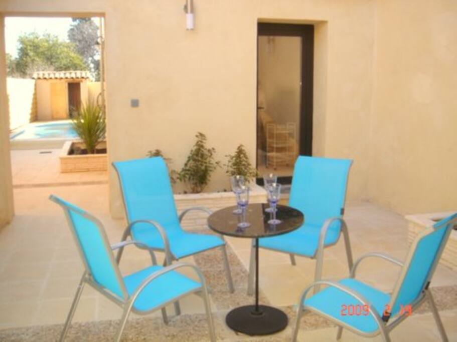 Enjoy a drink in the secluded court yard