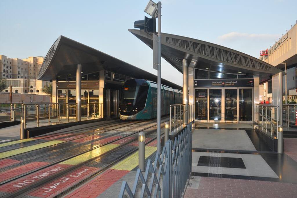 Tram station next to the building.