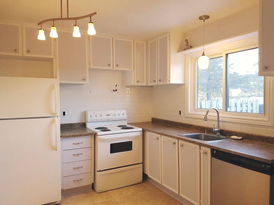 This updated kitchen has a microwave, hotpot, stove, and oven. A shelf in the fridge will be made available for your groceries.