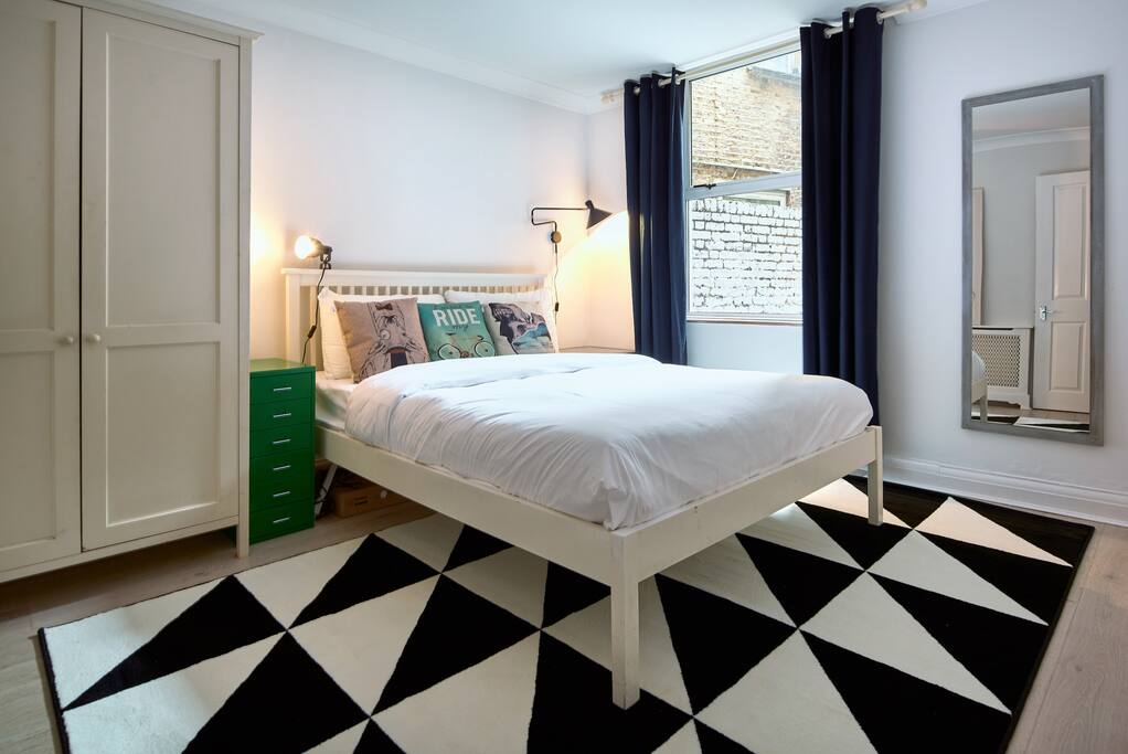 The master bedroom has lots of character - the design is stylish and modern.