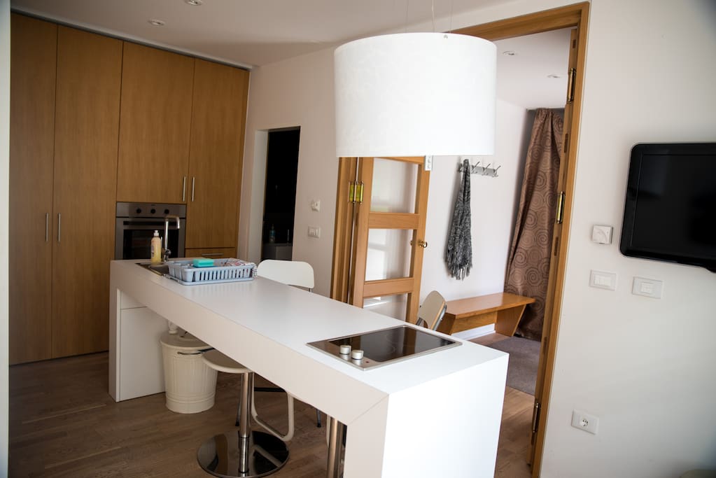 Living space with nice small kitchen