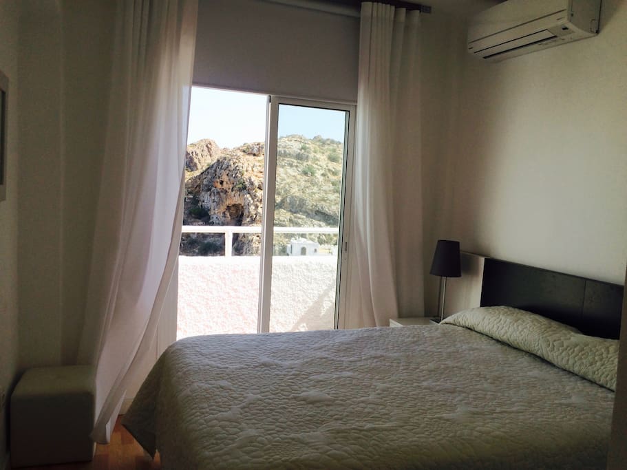 Bedroom 1 with views of the mountain and Mediterranean sea