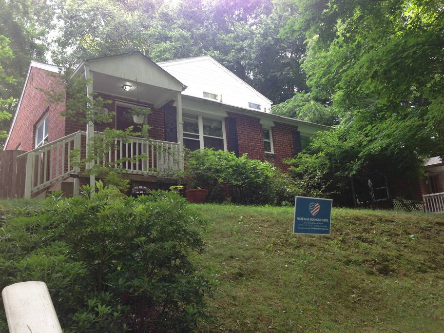 House in the woods! There are a number of stairs from the on street parking but we think it's worth it! When you look out of the house's front windows, it feels a bit like a treehouse on a little hill above the street.