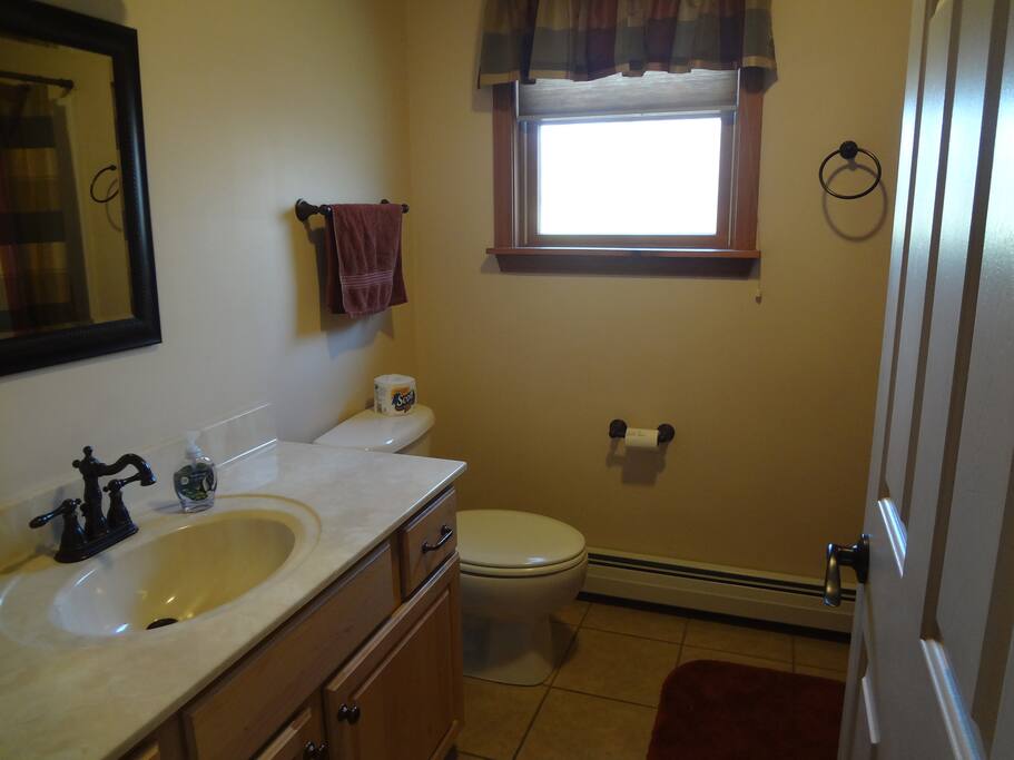 Private bathroom with tub/shower