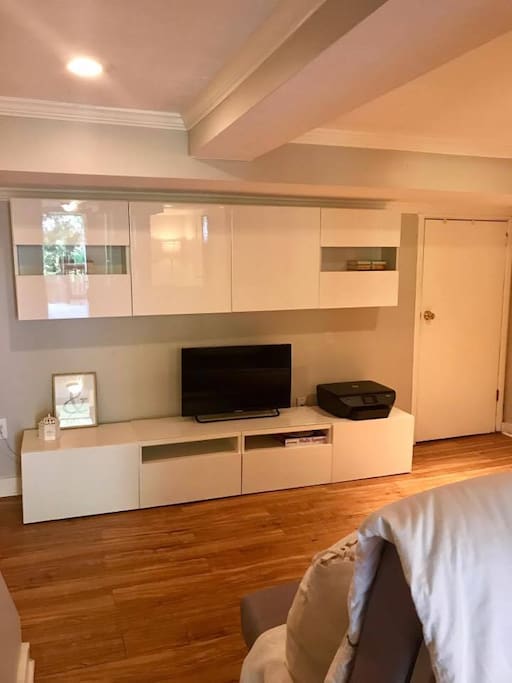 TV monitor can be hooked up to laptop for streaming, wireless printer available for guest use. Bottom drawers available for personal storage.