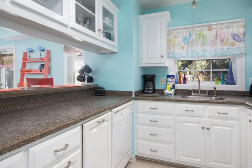 Dinners will be made with love in this galley-style kitchen, which opens to the main living space
